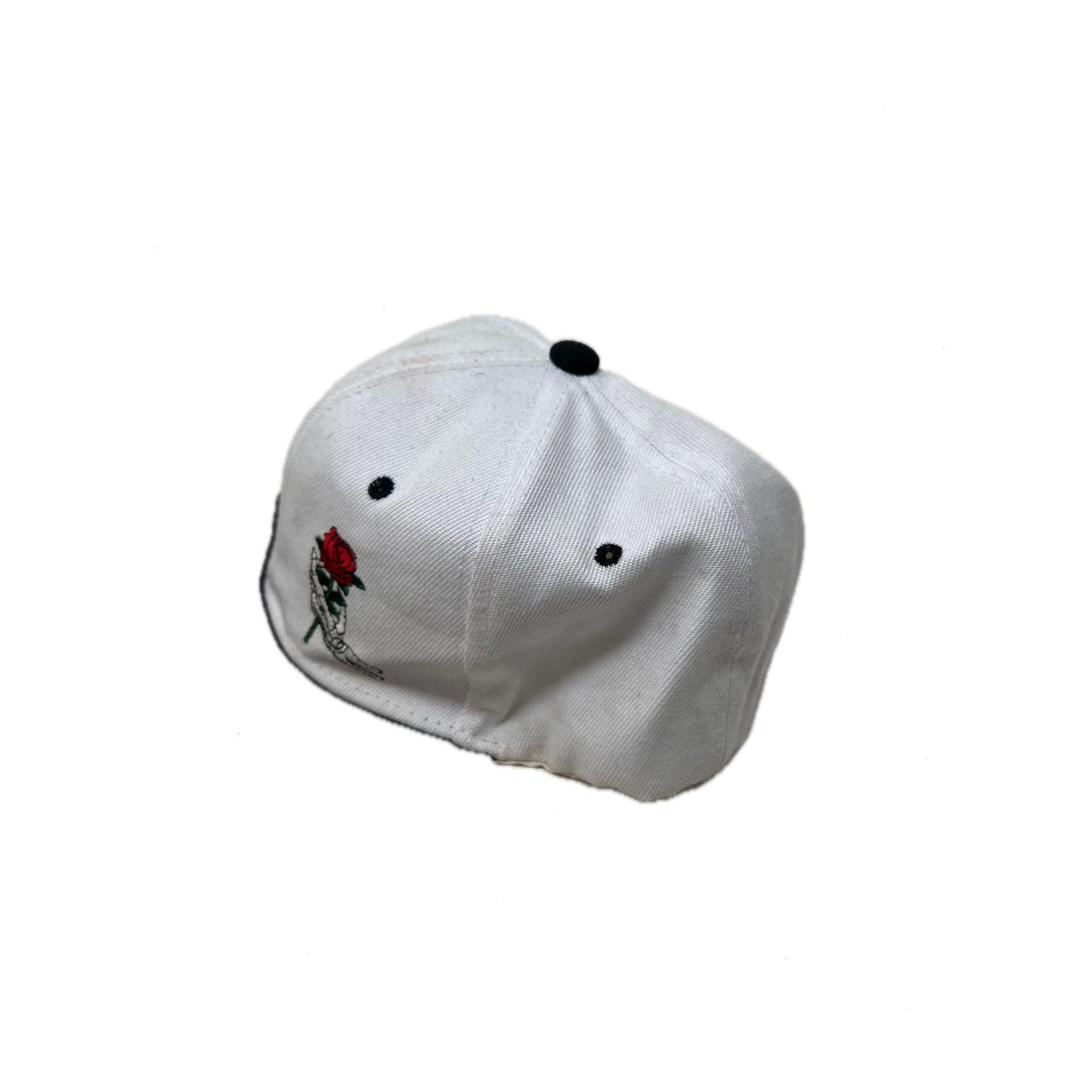 Rose held by Skeleton Fingers Snapaback Baseball Hat