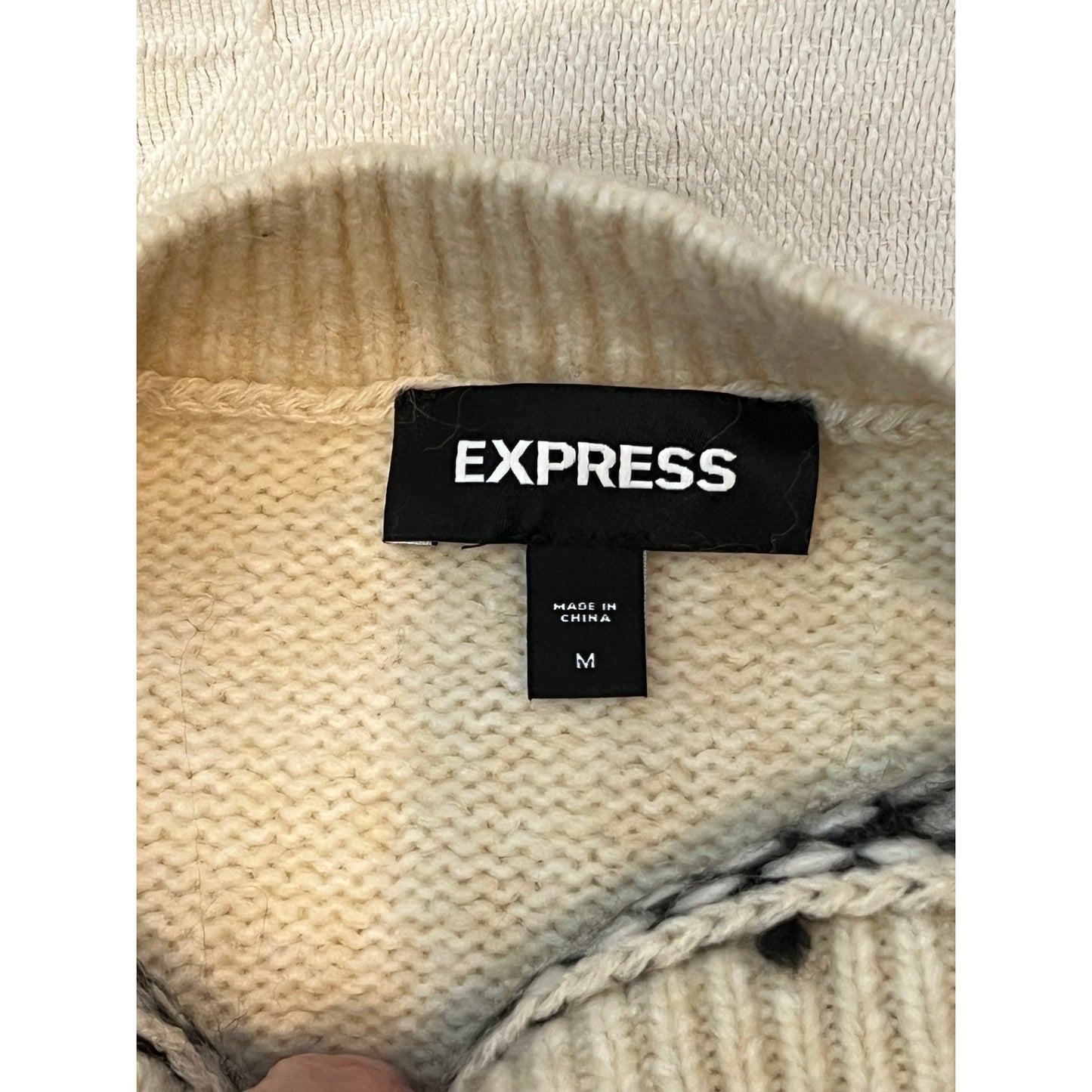 Pull douillet Express noir et crème taille M femme