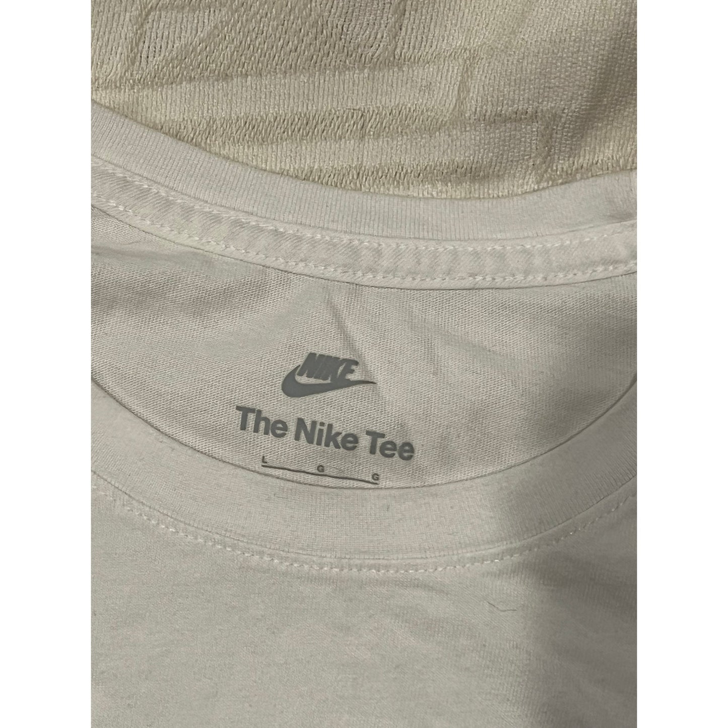 La camiseta Nike blanca para hombre, talla L.